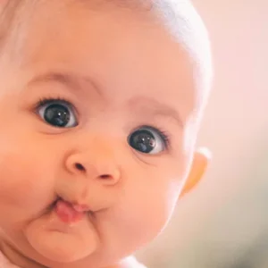 A baby with a funny expression